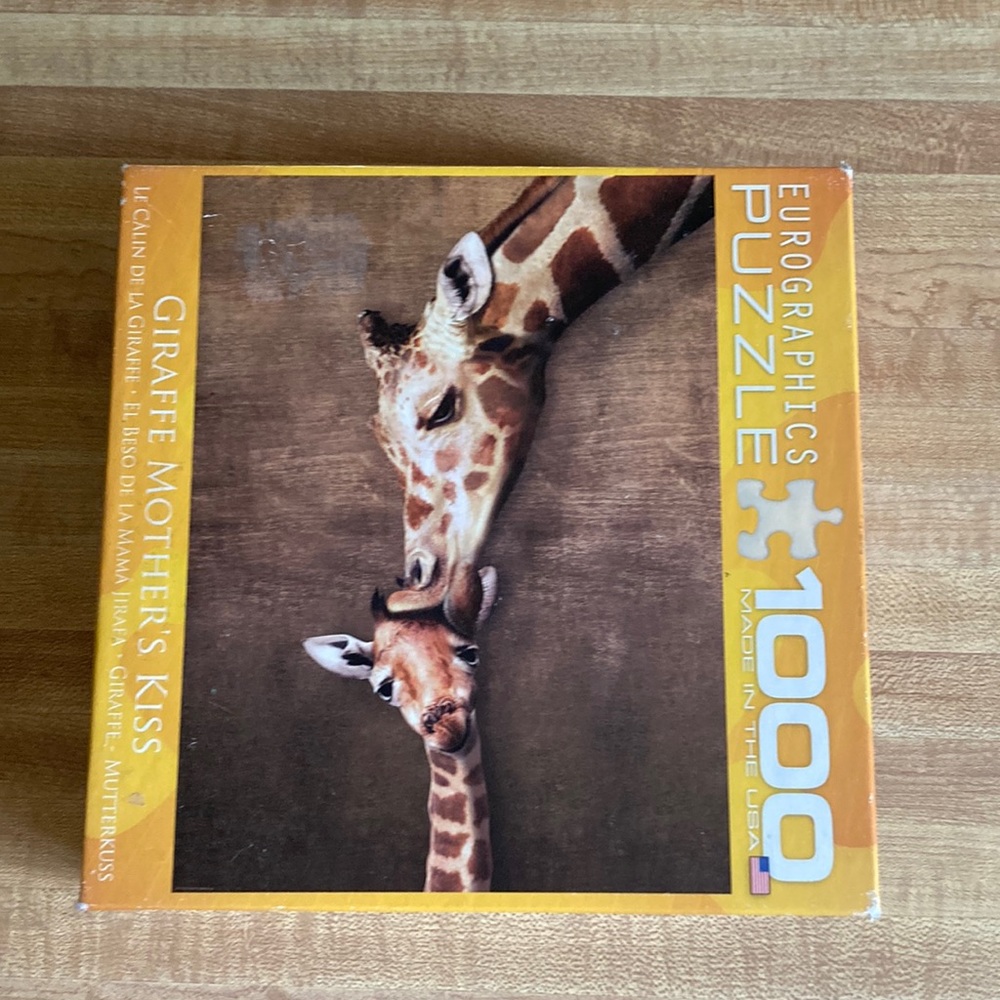 Giraffe mother’s kiss puzzle